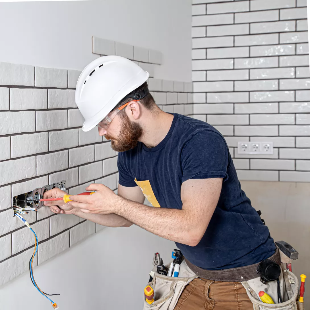 electrician-construction-worker-with-beard-overalls-installation-sockets-home-renovation-concept.jpg